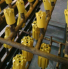 Top hammer rock drilling tools button bits